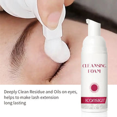 Sensitive eyelash foaming cleanser in a pump bottle on a white background