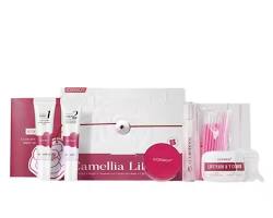 Camellia Lip treatment kit containing a white and pink box, a tube of lip gloss, a small jar, and a clear bag of applicator tips, displayed on a white background.
